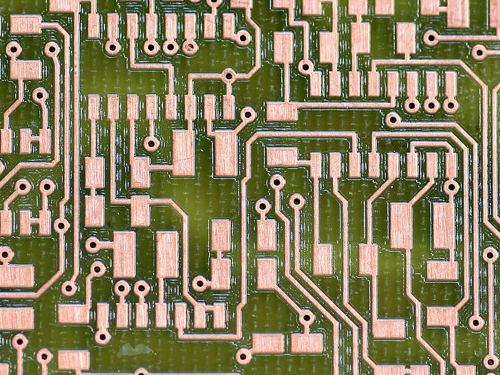 Circuitry on FR4 material, including rubouts and galvanic through hole plating